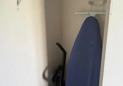 a blue cloth hanging on a wall in a room at The Point Hotel & Suites - 705S Luxury - Pool view - Close to Universal in Orlando