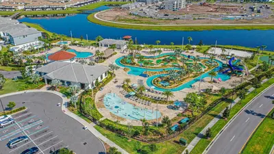 an overhead view of a water park at a resort at Only 5 Miles from Disney! Free Water Park! 2 Bed, 2 Bath Condo, Sleeps 8 in Kissimmee