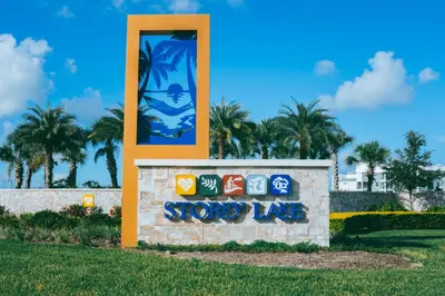 a sign for a store in a park at Renewed Luxury Townhouse with private pool in Kissimmee
