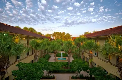 an aerial view of a courtyard with palm trees at Blue Tree Resort at Lake Buena Vista in Orlando