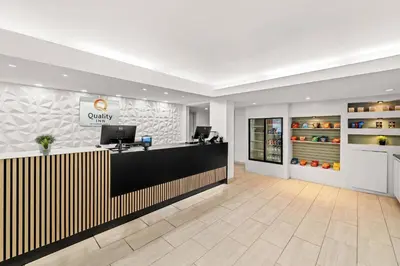a lobby of a dental office with a reception desk at Quality Inn Orlando Near International Drive in Orlando