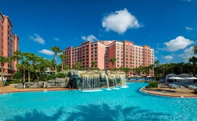 a pool at a resort with a water slide at Caribe Royale Orlando in Orlando