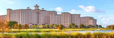 a rendering of a large building with a lake in front at Rosen Shingle Creek Universal Blvd in Orlando