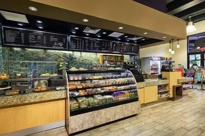a grocery store aisle with a display of food at Sheraton Vistana Villages Resort Villas, I-Drive Orlando in Orlando