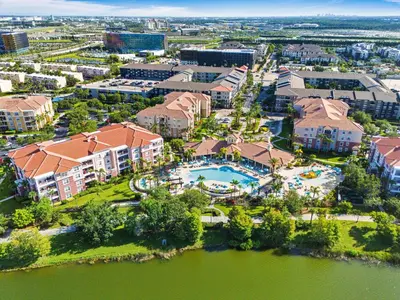 an aerial view of a resort with a pool at Vista Cay at Epic Universe - Luxury 3 bedroom Townhouse in Orlando