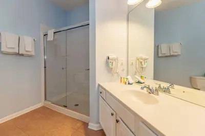 a bathroom with a sink and a shower at Vista Cay at Epic Universe - Standard 3 bedroom condo in Orlando