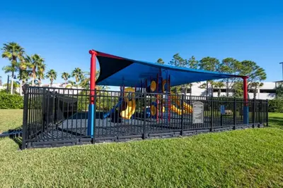 a playground in a park with a playset at 13-403 Your Vista Cay Home in Orlando