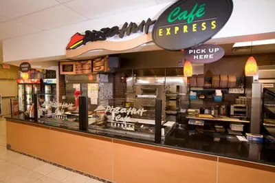 a fast food restaurant with a large display case at Lake Buena Vista Resort Village and Spa, Near Disney in Orlando