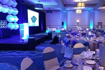 a group of tables in a banquet hall at Wyndham Lake Buena Vista – Disney Springs® Area in Orlando