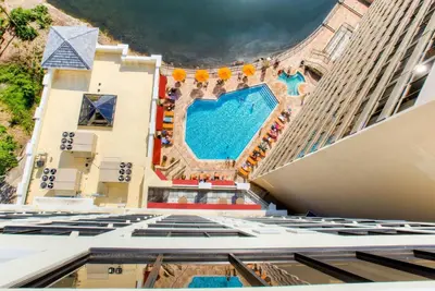 an overhead view of a pool on a building at Ramada Plaza by Wyndham Orlando Resort & Suites Intl Drive - Newly Renovated! in Orlando