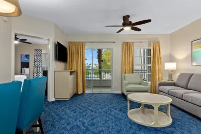 a living room with a couch and a table at Club Wyndham Cypress Palms in Kissimmee