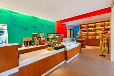 a store with a counter with food on display at Sheraton Orlando Lake Buena Vista Resort in Orlando