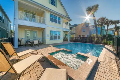 a swimming pool in the backyard of a house at Sandcastles & Sunshine Cottage With Private Pool Near Disney With Margaritaville Resort & Island H20 Access - 8025Su in Orlando