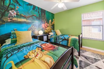 a bedroom with two beds and a large mural at Lovely Disney Vacation House in Orlando