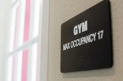 a sign on a wall that says gin has graduating at Great townhouse in great luxurious community, poolgym Close to Disney! in Kissimmee