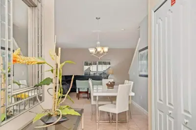 a dining room with a table and chairs at 2947BPD-SVH in Kissimmee