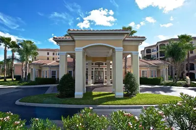 a villa with a gazebo in front of a building at WorldQuest Orlando Resort in Orlando