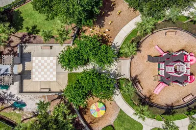 an overhead view of a park with a playground at Spacious Kissimmee Villa - 3 Mi to Disney World! in Orlando