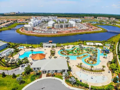 an aerial view of the water park at the resort at Lovely 2BR Codo with 2Clubhouses & Kids Splash Pad in Kissimmee