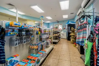 a store aisle of a store with toys and other items at Our Mickey Mouse House Townhome with Pool! in Orlando