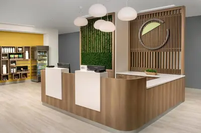 a lobby of a store with a reception desk at Element Orlando Universal Blvd. in Orlando