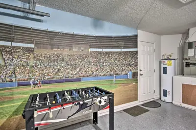 a mural of a baseball game in a stadium at Family Home with Game Room 9 Mi to Disney World in Orlando