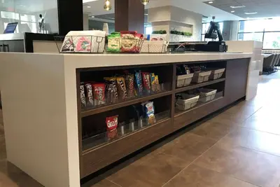 a counter in a store with food on it at Wyndham Garden Orlando Universal / I Drive in Orlando