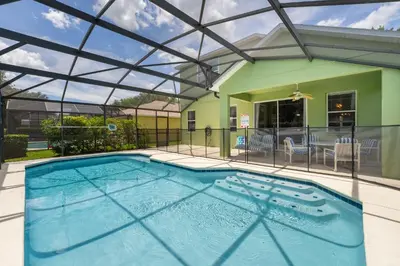 a swimming pool with a glass roof at 1323ZUREIQ-Zureiq Dreams (S) in Orlando