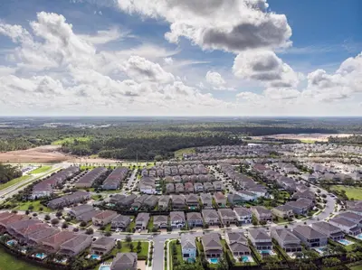an aerial view of a large apartment complex at Upscale Modern Getaway home with heated pool/hot tub, 9 beds 8.5 bath Sleeps 18+ in Orlando