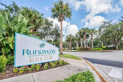 a sign for the runaways beach club with a street at 2 Bedroom Vacation Condo 2011 in Kissimmee