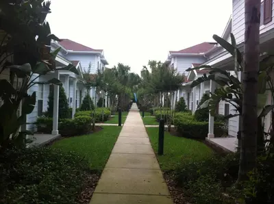 a sidewalk in front of a row of houses at HAPPY PORT, your home very close to entertainment in Kissimmee