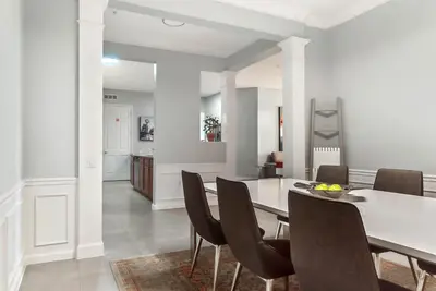 a dining room with a table and chairs at Vista Cay in Orlando