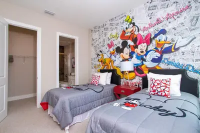 a bedroom with two beds and a mural at Gorgeous 4 Bedroom Family Friendly Close to Disney 7573 in Orlando