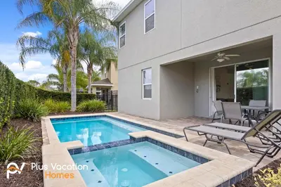 a swimming pool in the backyard of a home at 7541 Huge 8BD Home - POOLSpa - GameMovie room in Orlando
