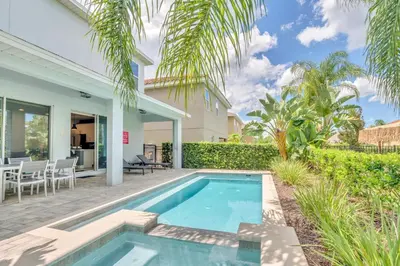 a swimming pool in the backyard of a house at 650 Lasso Drive in Orlando