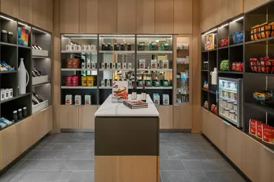 a store pharmacy with a counter in a room at AC Hotel by Marriott Orlando Downtown in Orlando