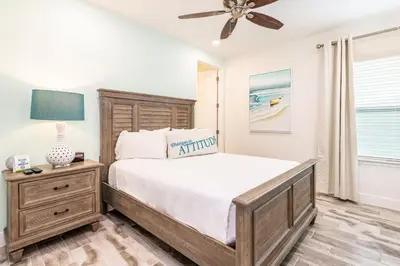 a bedroom with a bed and a ceiling fan at Beautiful Cottage With Private Pool Near Disney With Margaritaville Resort & Island H20 Access - 8153Su in Orlando