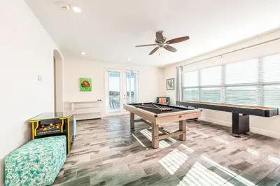 a living room with a pool table and a ping pong table at Beautiful Cottage With Private Pool Near Disney With Margaritaville Resort & Island H20 Access - 8153Su in Orlando