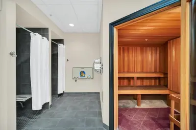 a bathroom with a shower and a walk in shower backdoor at Bright & Airy 3BR Suite Near Disney - Pool in Orlando