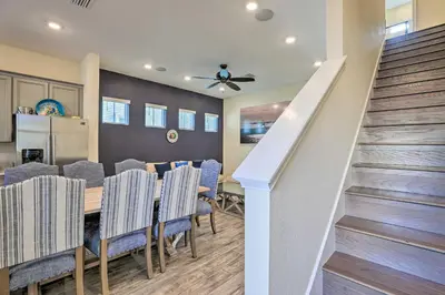 a dining room with a table and chairs at Home with Hot Tub 4 Mi to Disney! in Orlando
