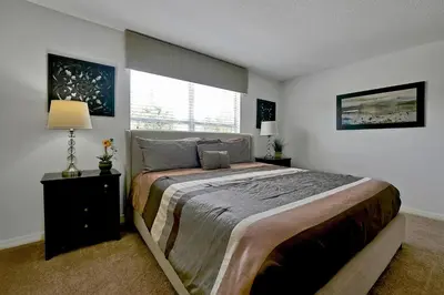 a bedroom with a large bed and a window at Rare Waterfront Wspashpool, Resort -3091Pp in Kissimmee
