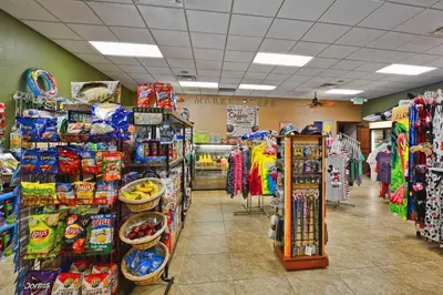 a grocery store aisle with a lot of products at Paradise Palms -5 Bed Townhome W-Splashpool-3046Pp in Kissimmee