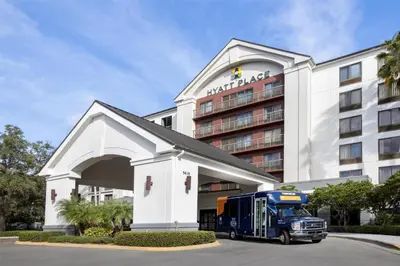 a blue truck parked in front of a hotel at Hyatt Place Orlando Airport in Orlando