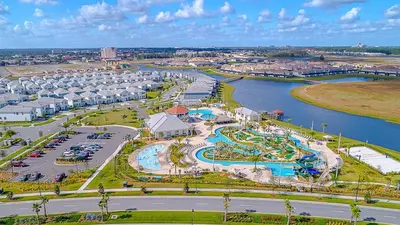 an aerial view of a resort with a water park at 2769RP VILLA 5 BED/5 BA (SANITIZED) in Kissimmee