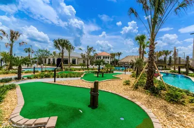 a golf course at the resort with a putting green at 3150 Paradox Circle 107 in Kissimmee