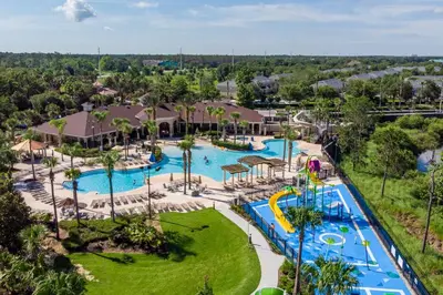 an aerial view of a pool at a resort at 7664 Comrow Street #104 in Orlando