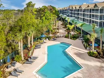 an aerial view of the pool at the resort at Inviting 3BR Condo with Private Patio - Near Disney in Orlando
