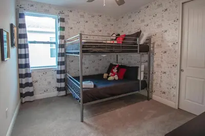 a room with two bunk beds in a room at Encore Resort 6 Bedroom Vacation Home with Pool (2102) in Orlando