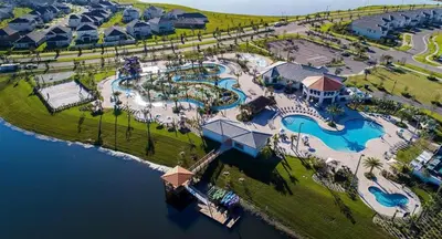 an aerial view of a resort with a pool at Amazing apartment in lux resort Storey Lake with great amenities 10 miles to Disney! in Kissimmee