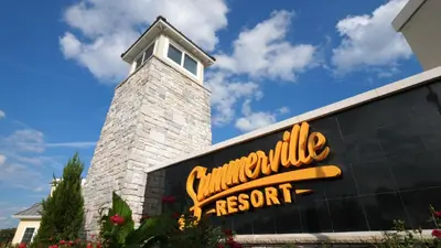 a sign for a restaurant on the side of a building at Summerville Resort 4 Bedrooms Villa in Orlando